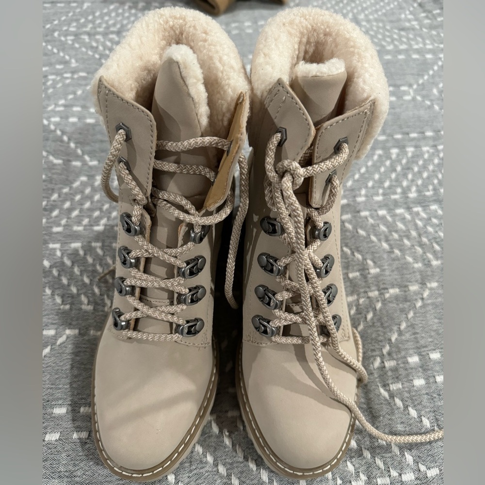 DV fur trimmed lace up boots